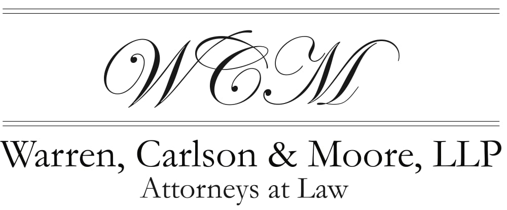 Warren, Carlson & Moore, LLP, Niwot, Colorado Logo